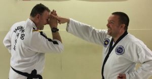 Grandmaster Keith E Finch and Master Jon Gladwin see the funny side of training
